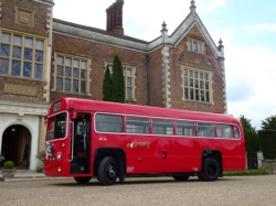 Cute single deck classic London bus ready for guests - North Mymms Park
