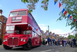 Bus at street party with red, white and blue bunting - Streatham
