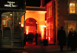 Bus entrance beside flame torches