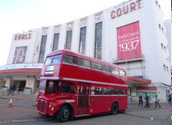 Shuttle bus awaits custom - Earls Court Exhibition Centre forecourt