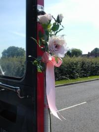 Flowers on right hand side of entrance
