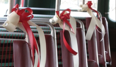 Red and white ribbons on seats