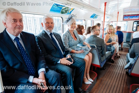 Wedding guests inside a Routemaster wedding bus
